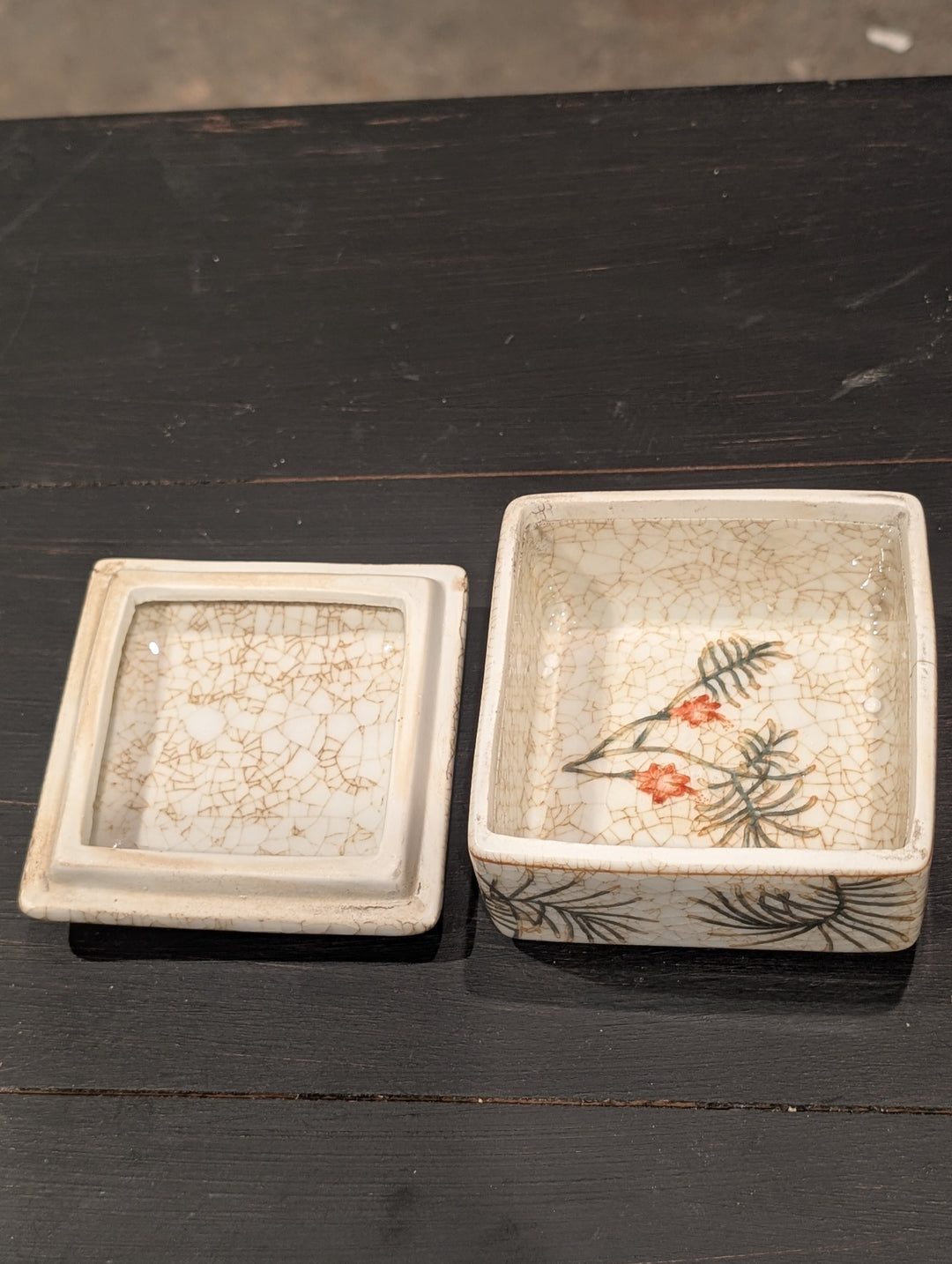 HomArt porcelain keepsake box shown open with glazed interior and painted floral sprig