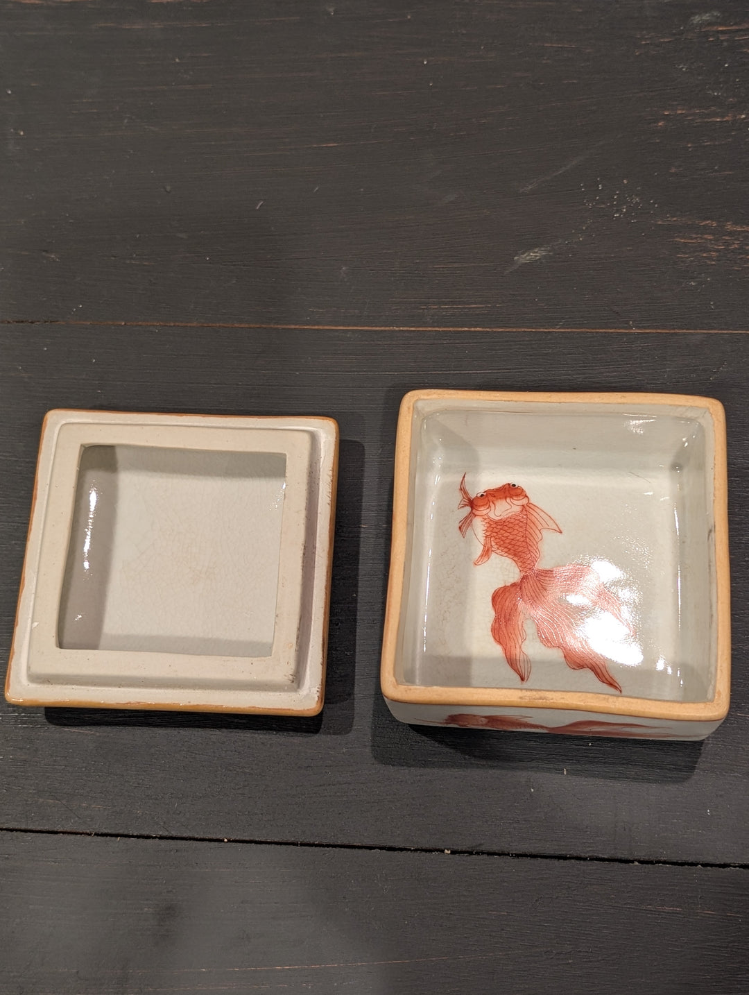 HomArt goldfish porcelain keepsake box shown open with a painted goldfish inside