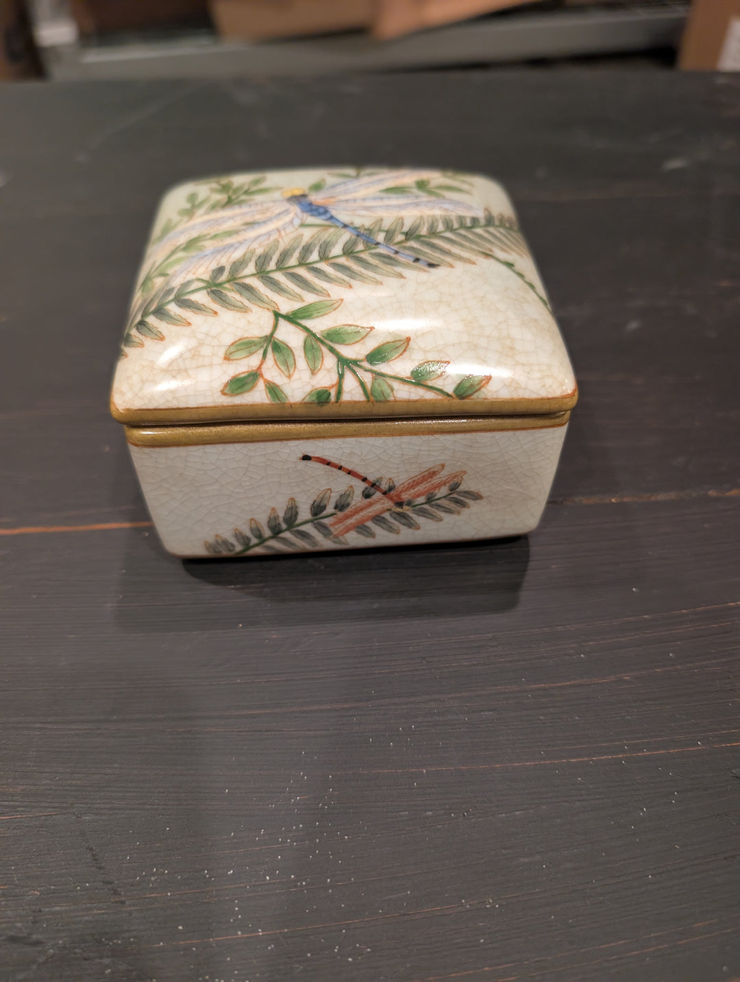 Side view of HomArt Morning Fern porcelain box with painted fern and dragonfly motifs