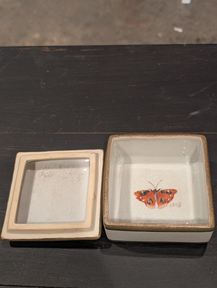 HomArt butterfly porcelain keepsake box shown open with a red butterfly painted inside